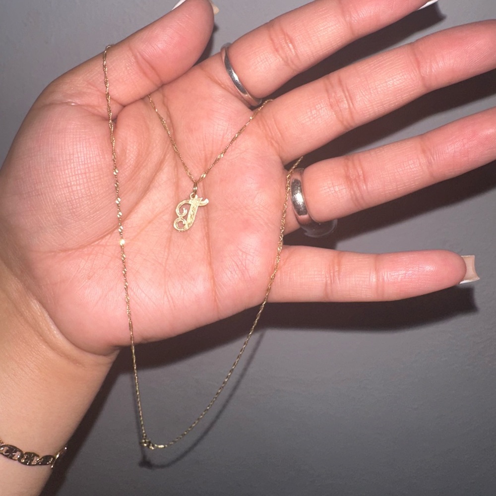 Gold necklace. 14k pendant and 10k rope